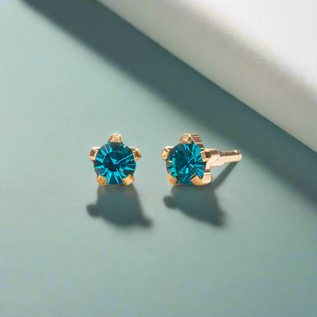 December – Blue Zircon Claw 012