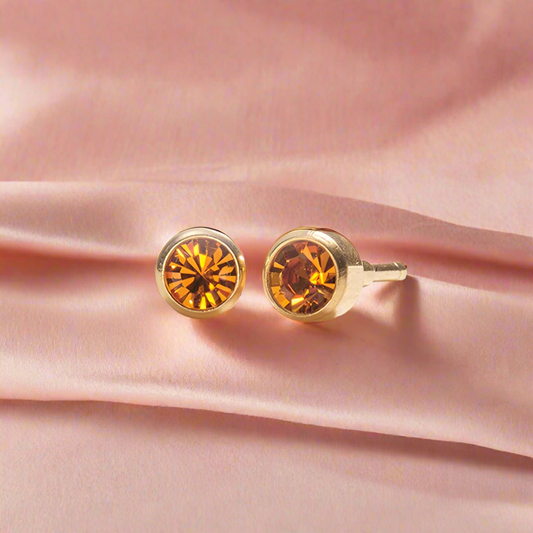 November – Topaz Bezel Set